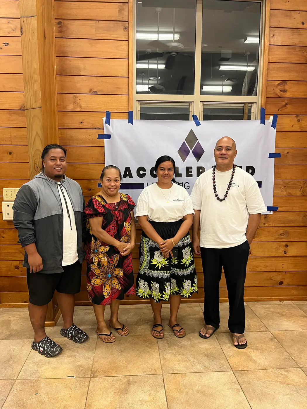 Accelerated Learning Center Board of Directors group photo, standing from left to right: JT Nonumwar,  Kathy Sound, Memory Weita Lean, Atkin Buliche.