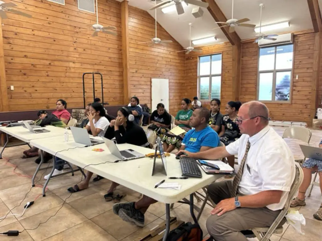 ALC learners practicing in a classroom