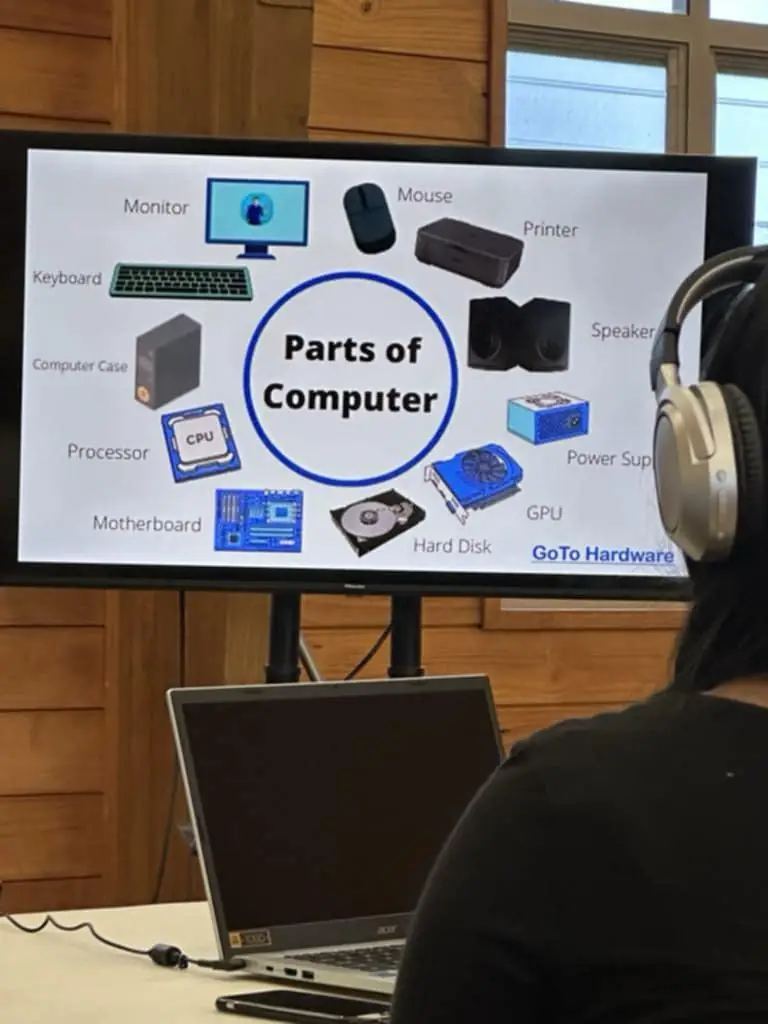 Instructor guiding a learner through Excel