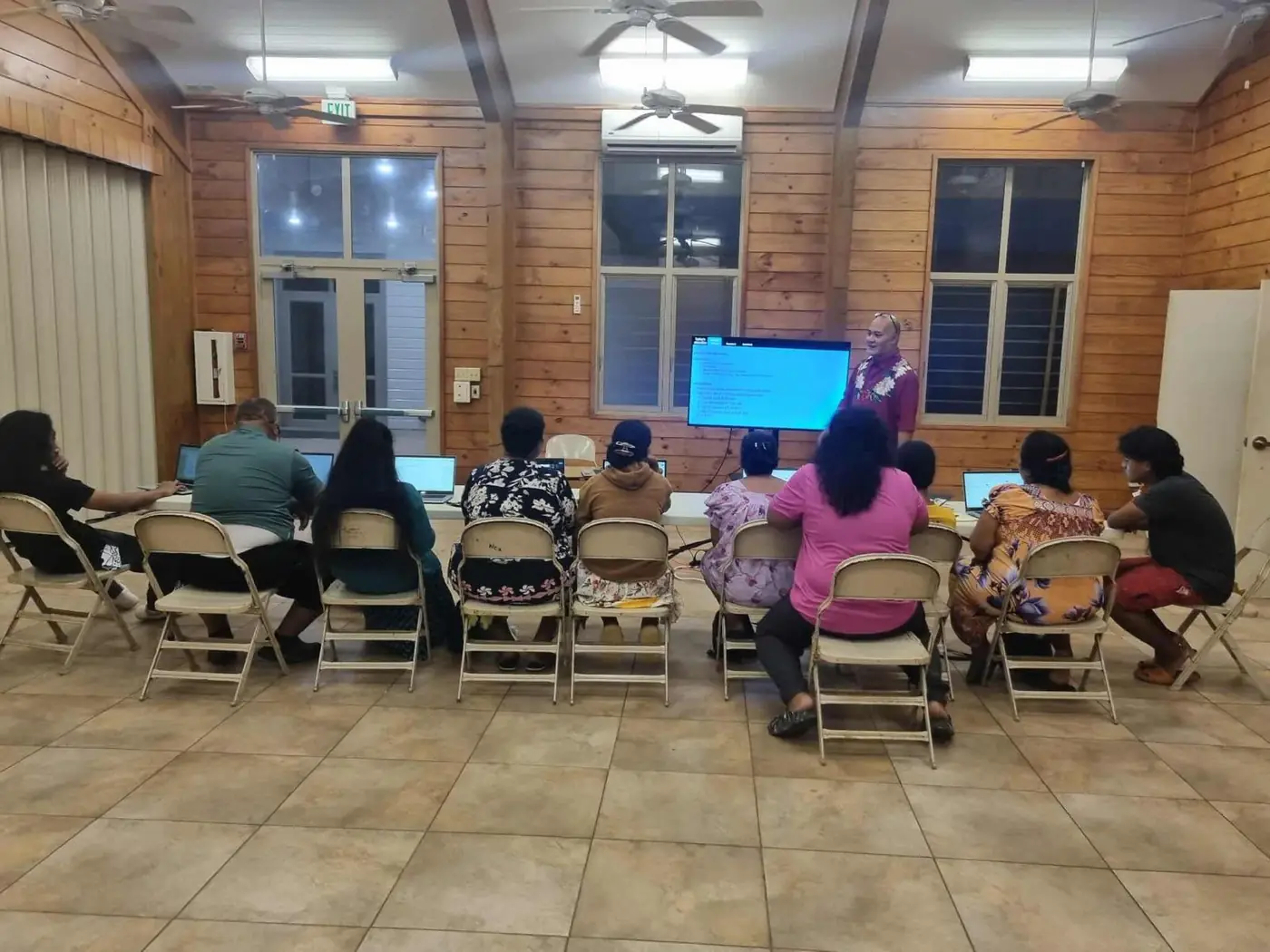 ALC classroom session with learners practicing typing